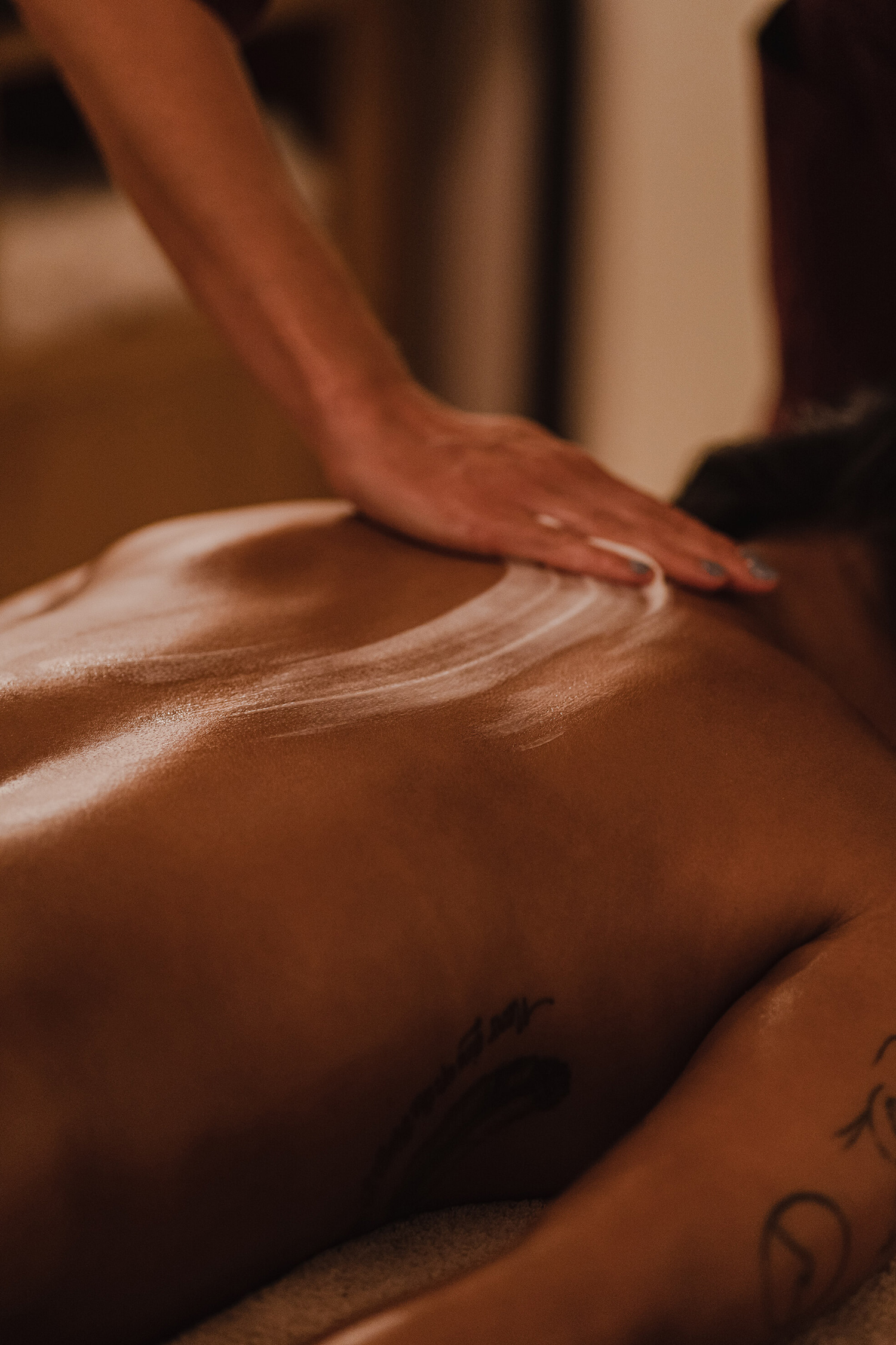 Woman having a massage in a relaxing room