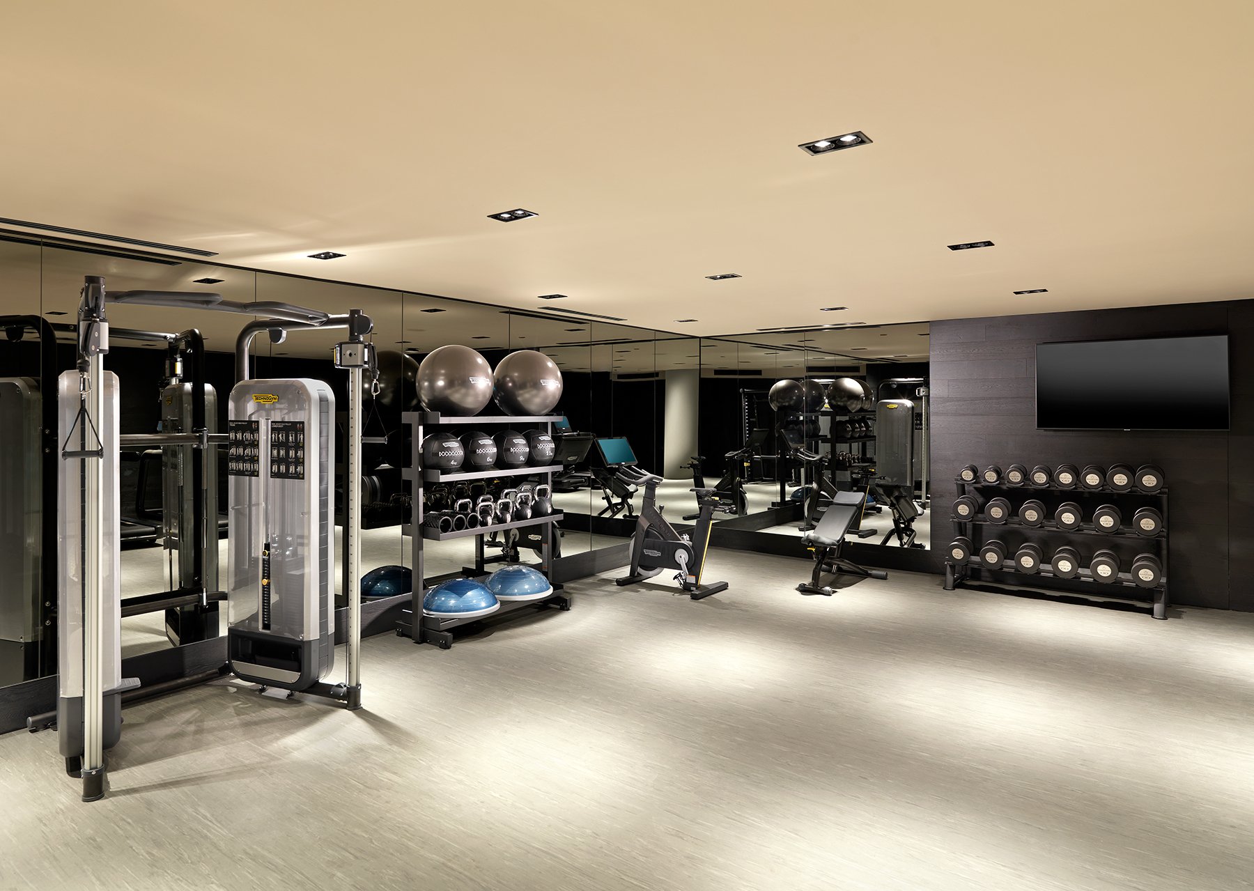 gym with gym equipment neatly organized