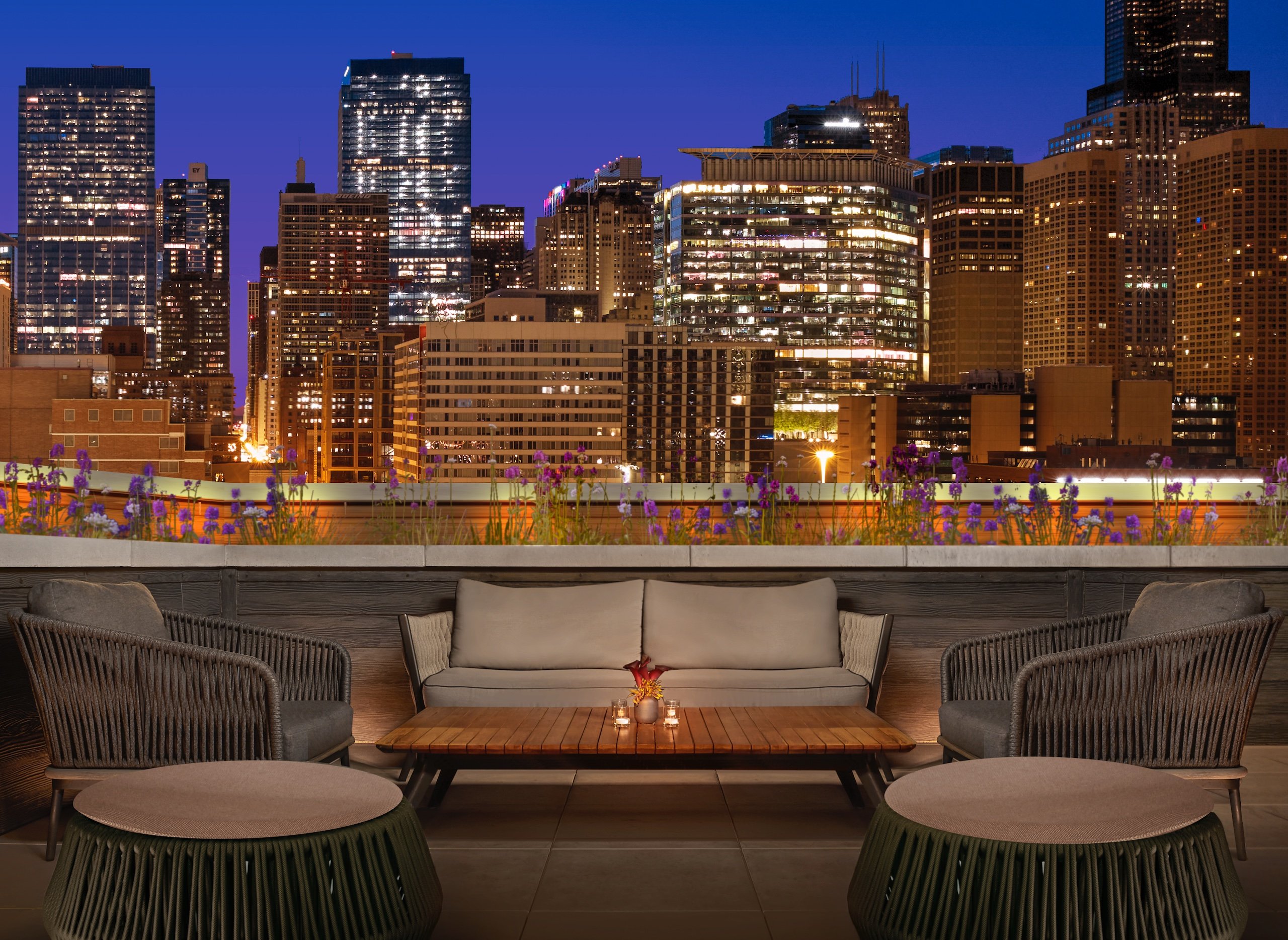 rooftop seating area with city skyline