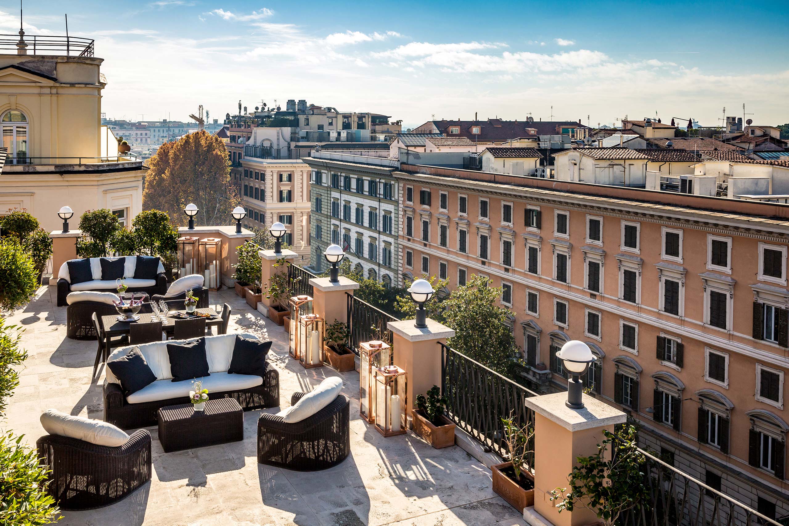 A stunning rooftop view of a city skyline featuring a prominent building in the foreground