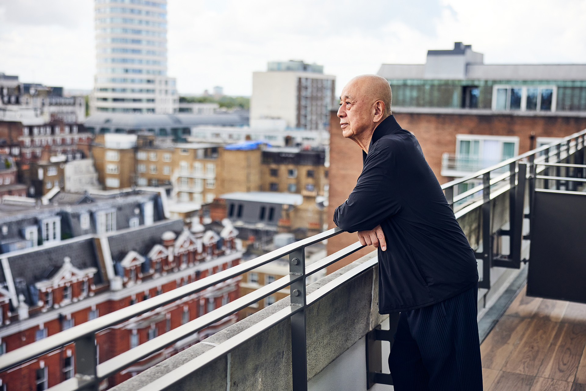 Nobu Matsuhisa looking the view from balcony