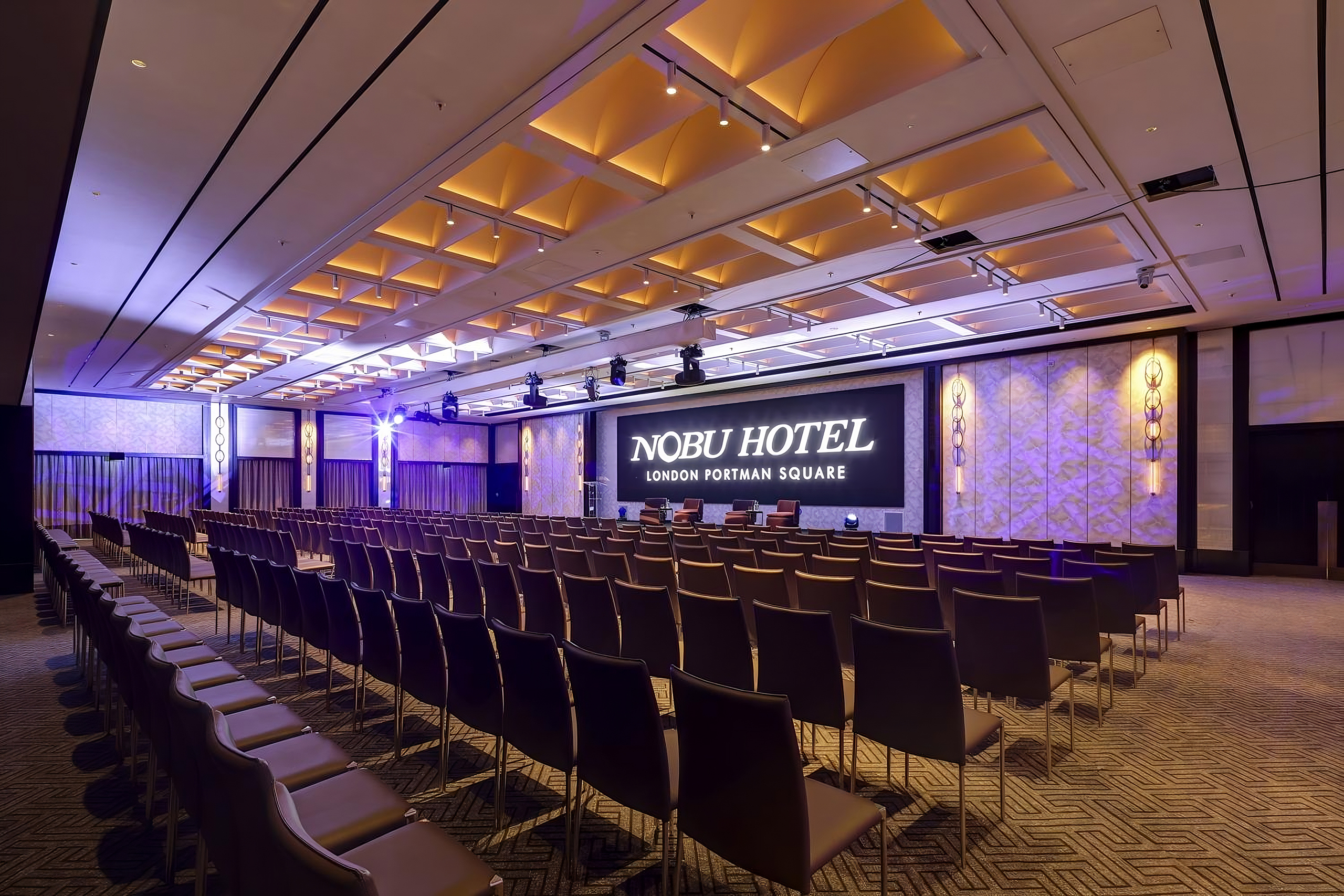 Meeting Space with purple light and chairs for London Portman Square