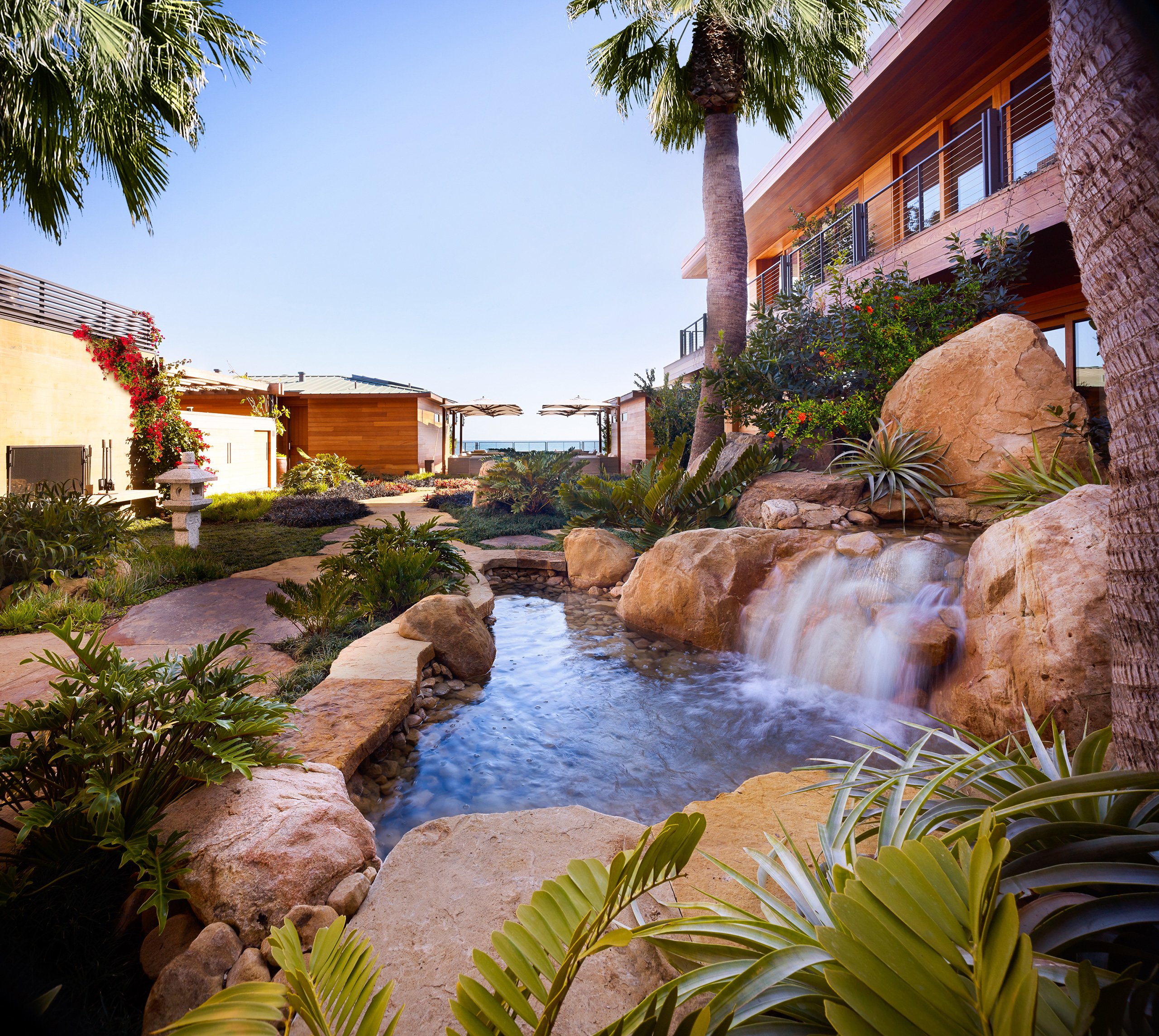 Courtyard view with pond at day time