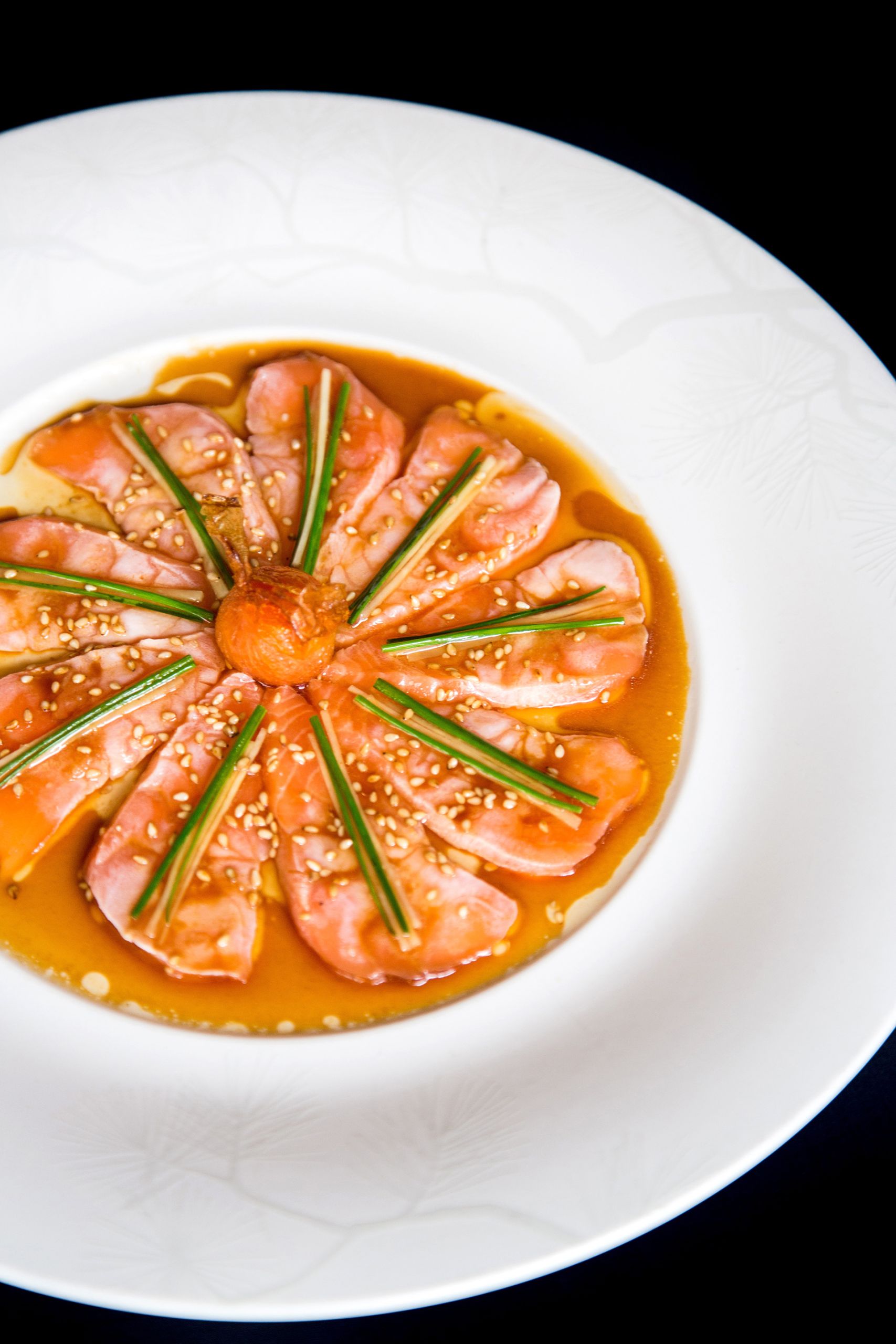 Salmon sashimi on the black table