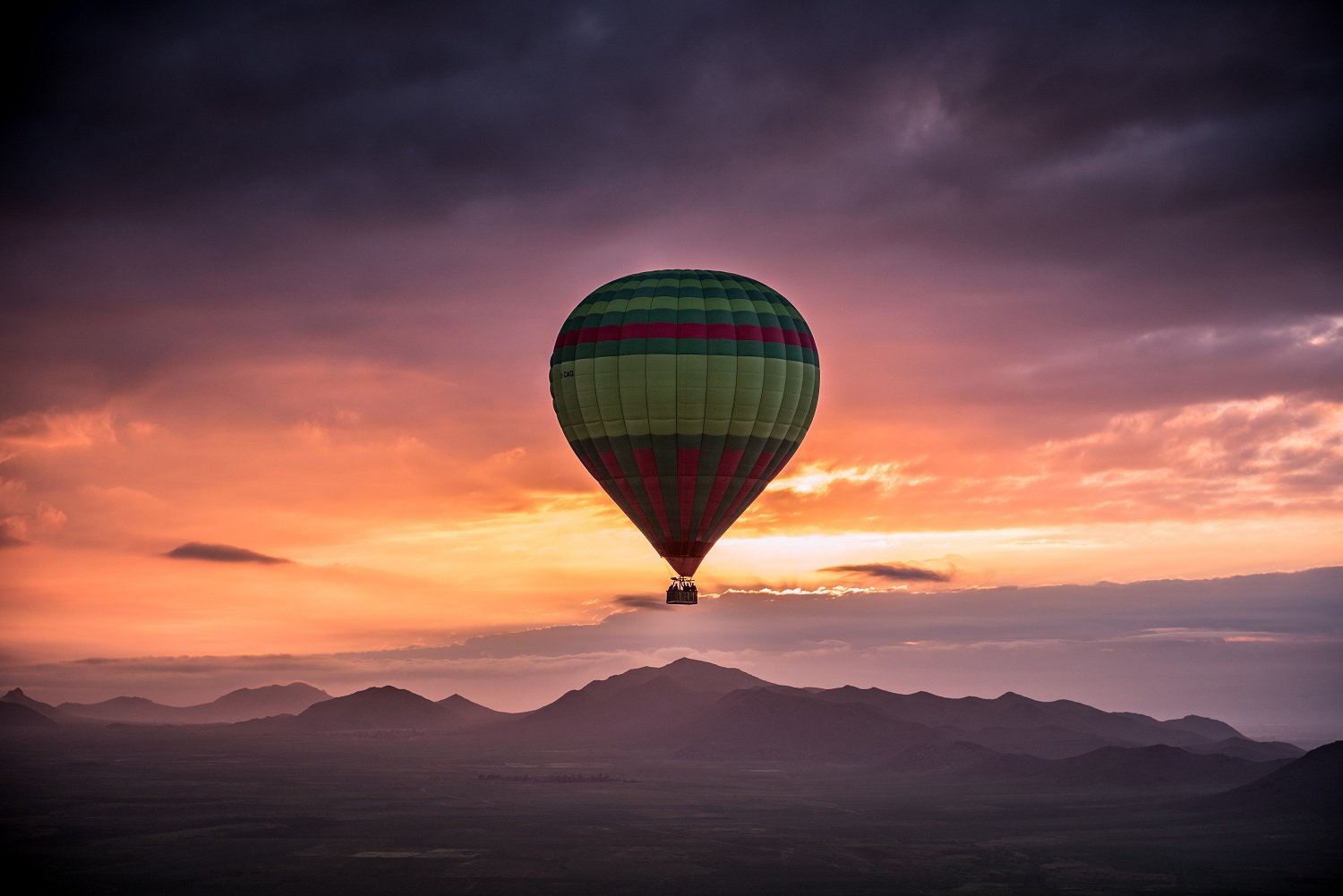 Hot air ballon in the sky at sunset