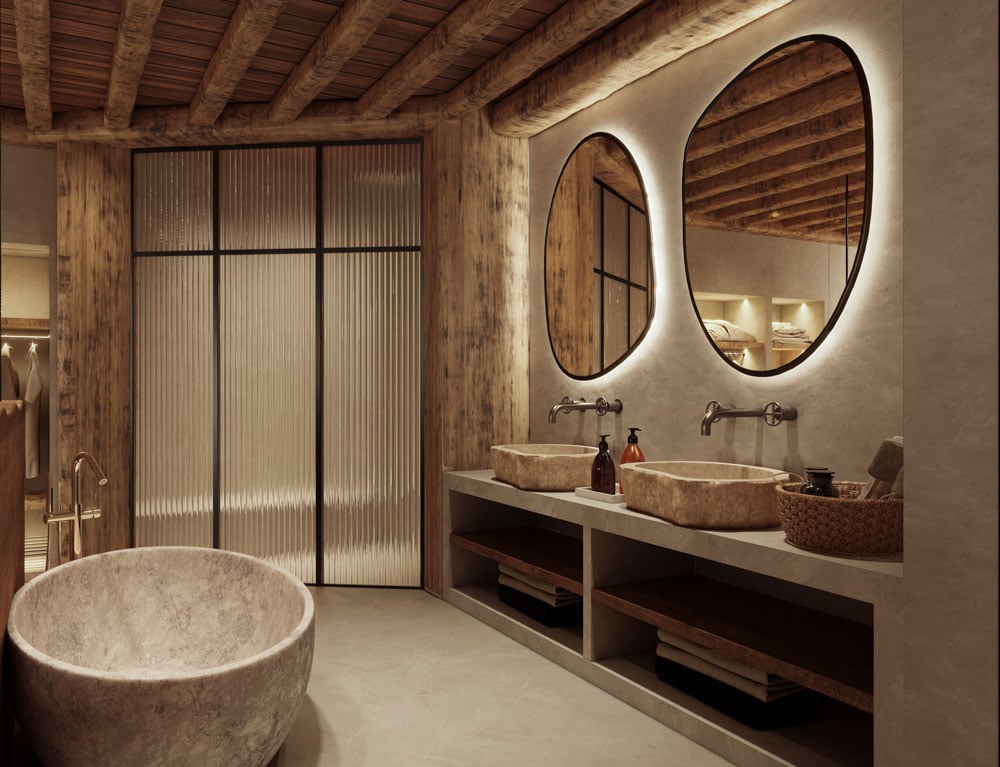 A stylish bathroom featuring a stone sink and two elegant mirrors reflecting the modern design