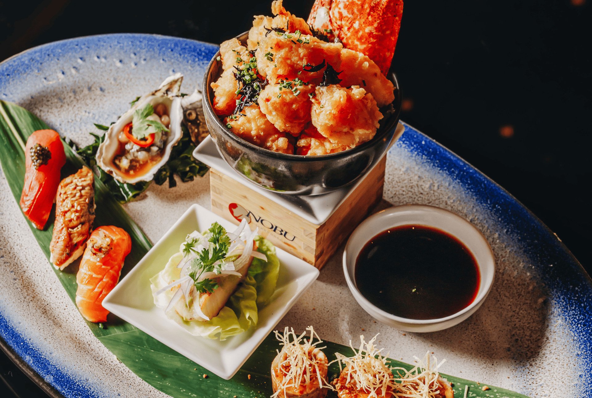 A vibrant assortment of foods arranged on a plate, highlighting a mix of colors and culinary styles.