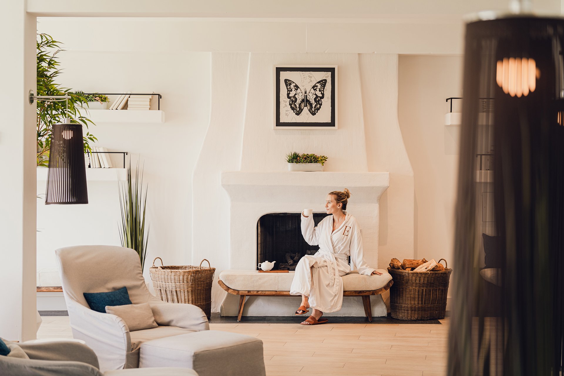 Women drinking coffee in spa lobby facility