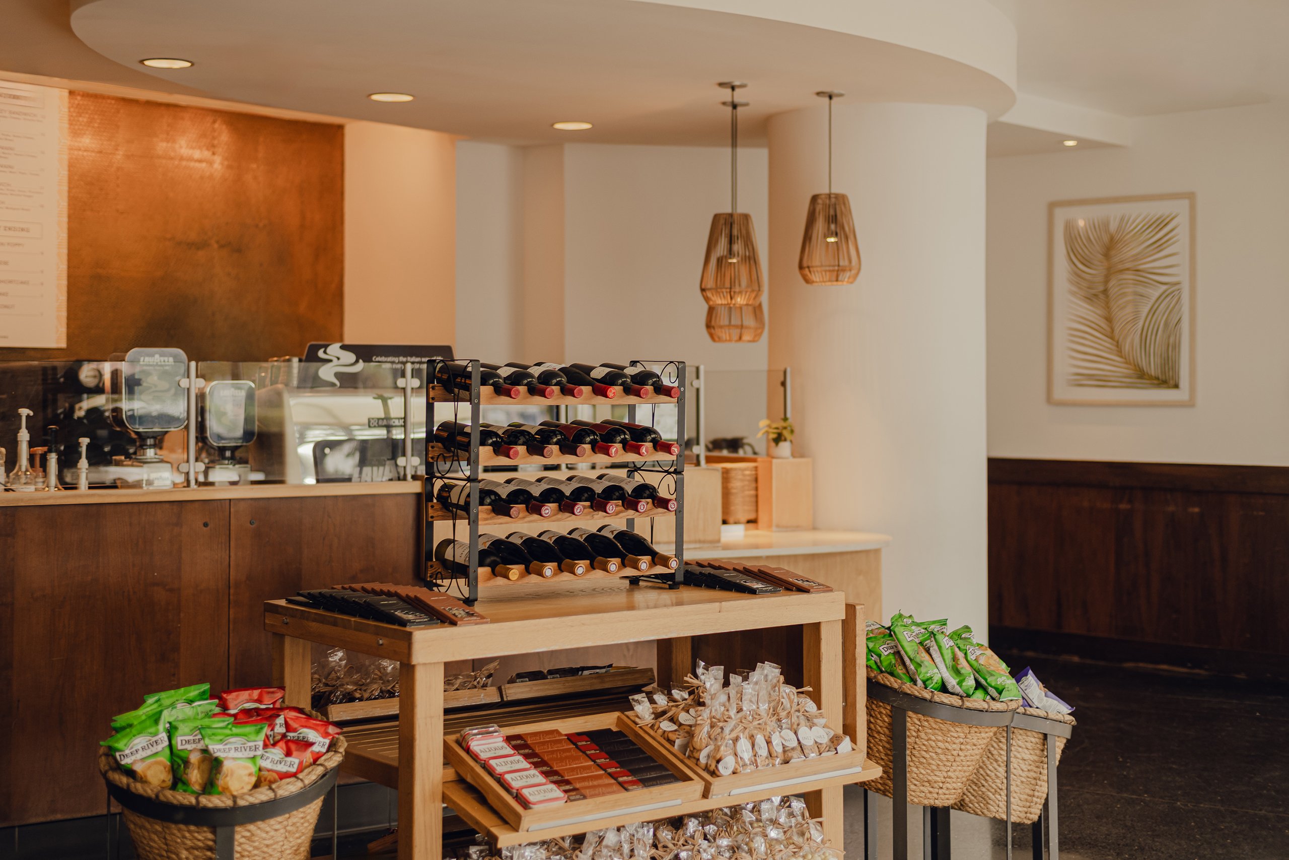 selections with some chips, nuts, wine, etc. near the counter at Cafe Inez