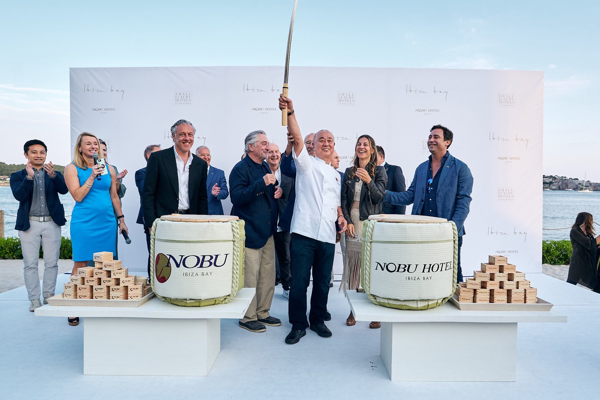 A group of people including Nobu showcasing Nobu hotel Ibiza Bay