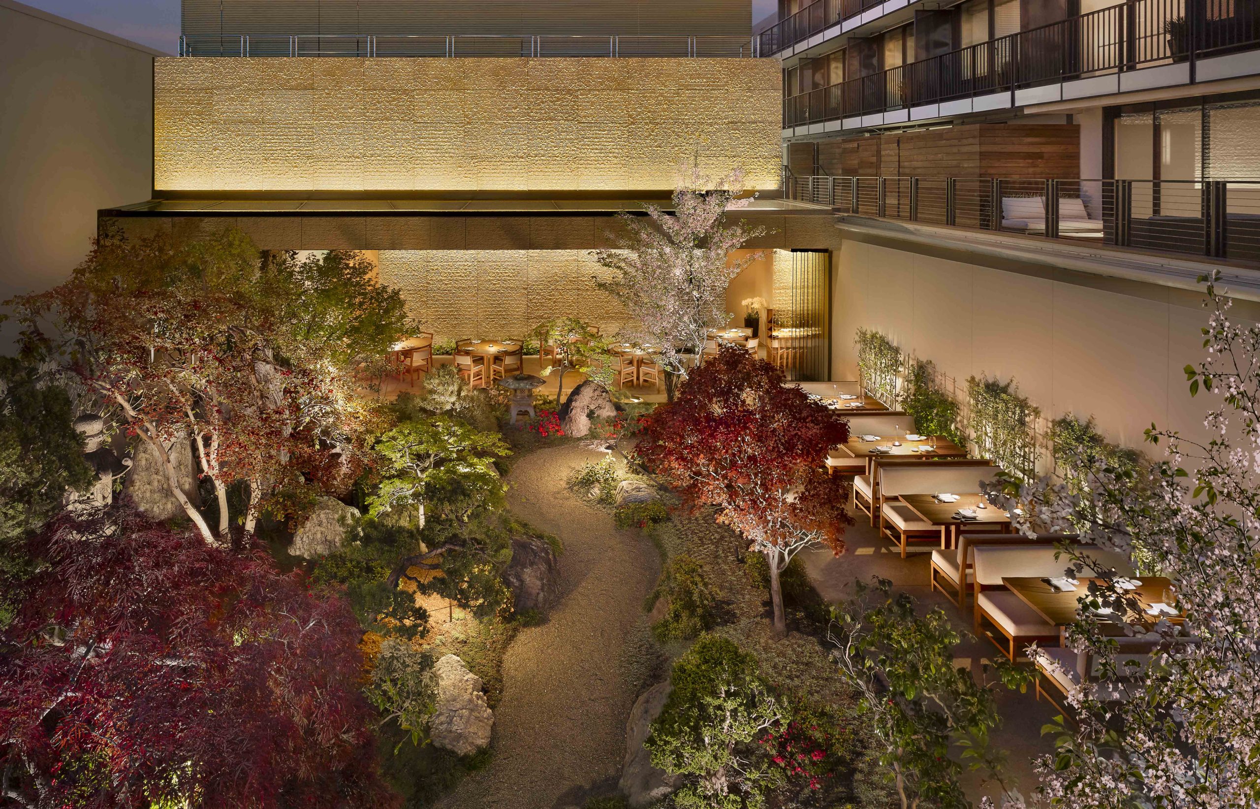 Overview of outdoor dining area with lights at night